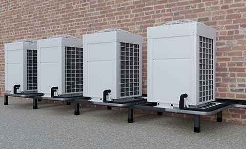 four air conditioners a part of a VRV and VRF system